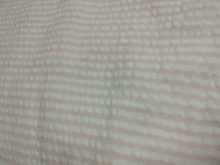 Chichonera cuna rayas blancas y rosas