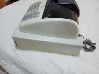 Maquina de cobrar regalo todos los rroyos de papel