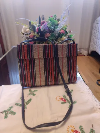 Bolso de mano con rayas