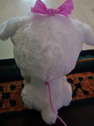 Perrito blanco de peluche con animación