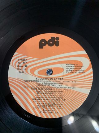 El Último de la Fila - El Loco de la Calle Firmado