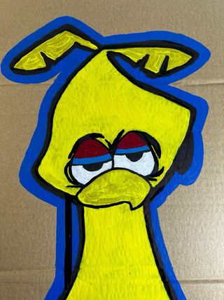 Cartón pintado personaje amarillo Medidas: 50x34