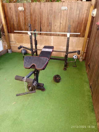 Press Banca con barra y Discos Musculación