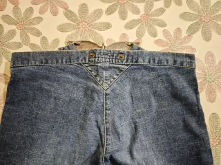 Jeans Fornarina con cintura a farfalla