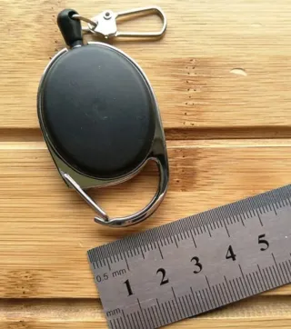 Coppia Moschettoni con cordino retrattile