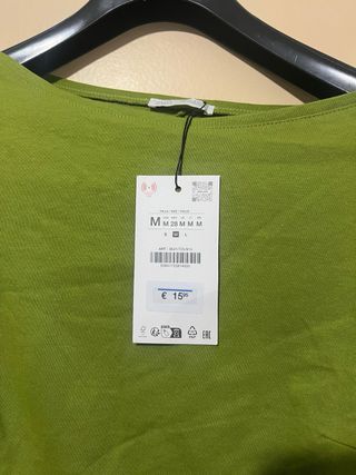 Camisa cuello barco asimétrica manga larga