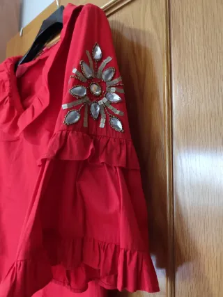 Conjunto falda pedrería manga codo