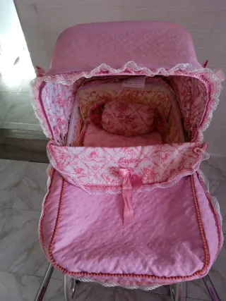 Coche de muñeca Reborn rosa
