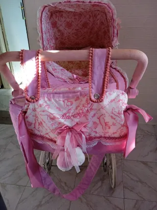 Coche de muñeca Reborn rosa