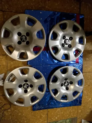 Tapacubos Peugeot Partner Originales (4uds)