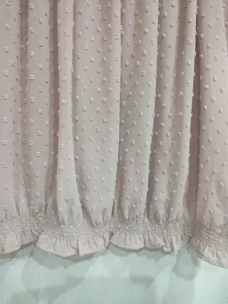 Blusa rosa con volantes