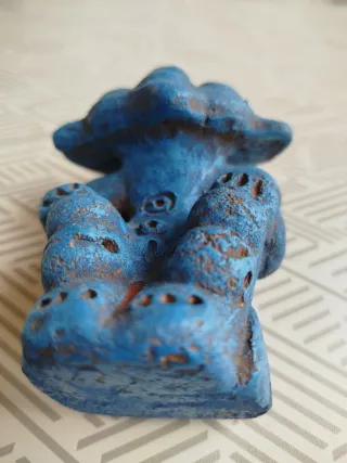 Figura de barro y furgo homenaje indios Taínos.