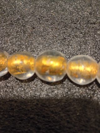 Collana con perle dorate