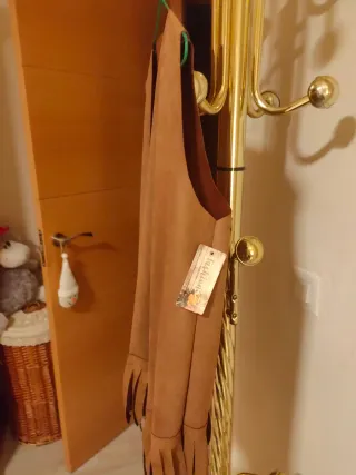 Chaleco ante flecos arena nuevo