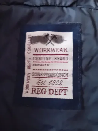 Chaleco acolchado azul marino con capucha