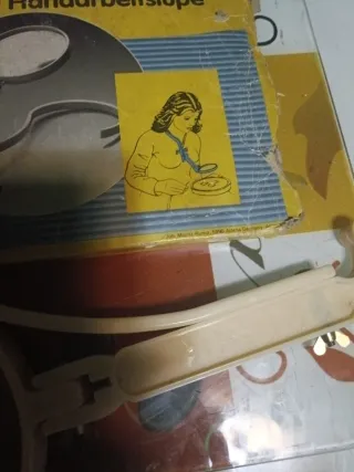 Lupa antigua alemana para costura