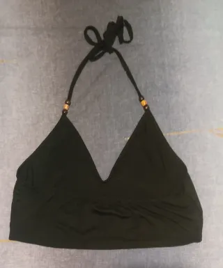 Top negro con soles dorados