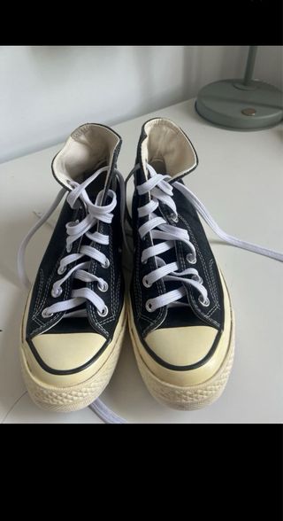 Botas converse altas negras unisex.