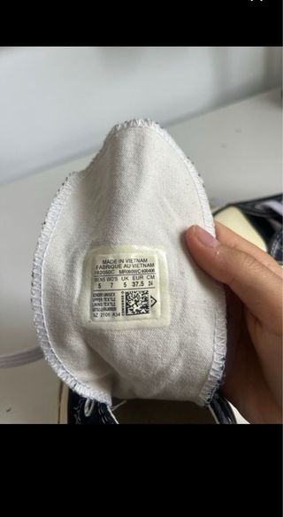 Botas converse altas negras unisex.