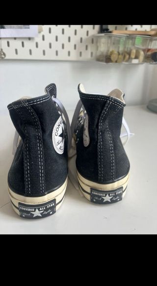 Botas converse altas negras unisex.