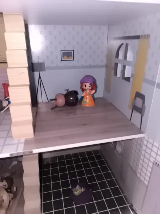 Casa de muñecas de madera