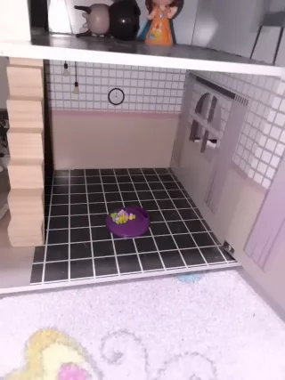 Casa de muñecas de madera