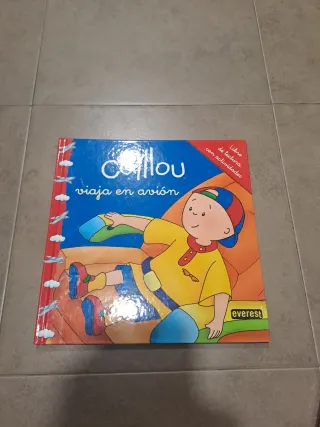 Caillou viaja en avión: Libro de lectura con ac...