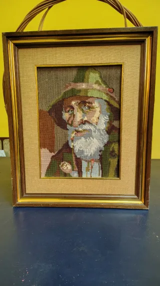 Cuadro a punto de anciano con sombrero