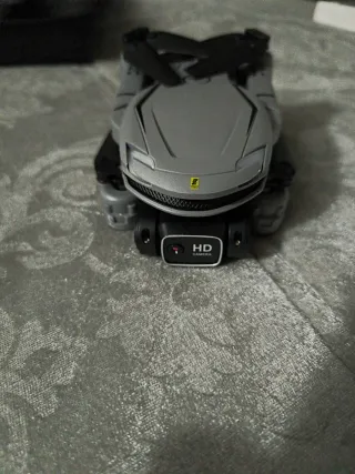 Dron Mini plegable con cámara gris