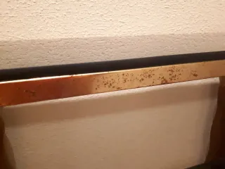 Recibidor de madera y cristal