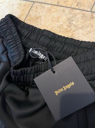 Shorts Palm Angels neri con banda laterale