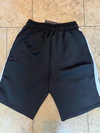 Shorts Palm Angels neri con banda laterale