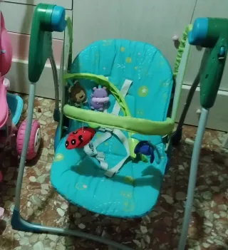 Triciclo y columpio para bebé