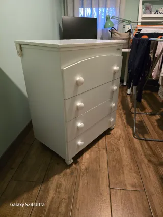 Cuna con bañera y cambiador