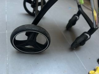 Carro de bebé rosa y cromado