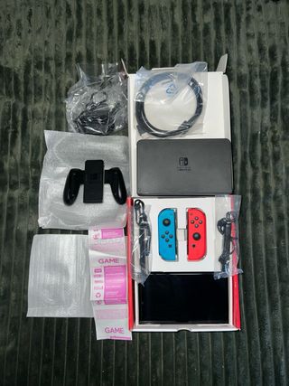 Nintendo Switch OLED Roja y Azul + Accesorios