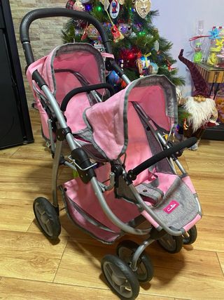 Silla gemelar rosa con capota para muñecas