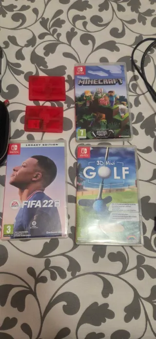 Nintendo Switch + Accesorios y Juegos