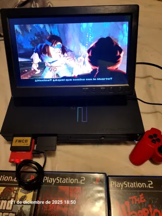 PS2 con pantalla, mando y juegos