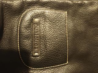 Bolso de cuero y pelo negro