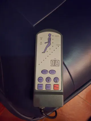 Sillón de masaje con reposapiés