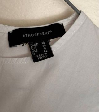 Blusa Atmosphere blanca elegante con nudo talla M