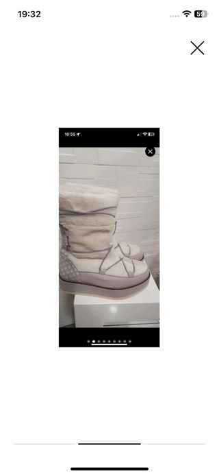 Botas de pelo grises y blancas