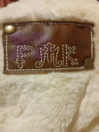 Chaleco beige forrado de pelo