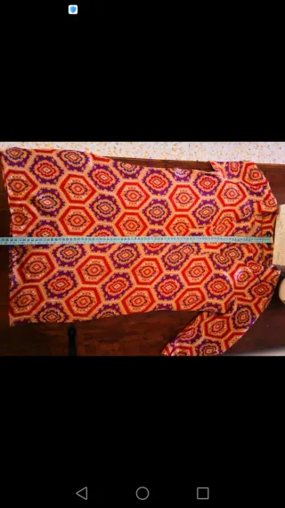 Blusón de estampado arabesco.