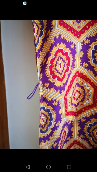 Blusón de estampado arabesco.