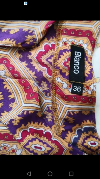 Blusón de estampado arabesco.