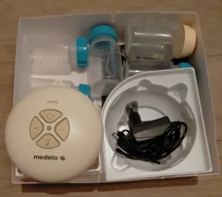 Sacaleches Medela Swing + 2 copas recolectoras