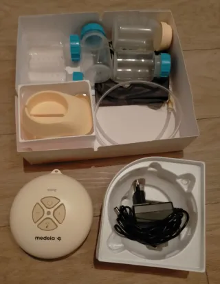 Sacaleches Medela Swing + 2 copas recolectoras