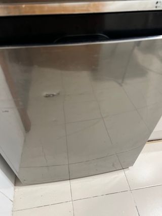 Nevera Samsung combi Gris con dispensador de agua.